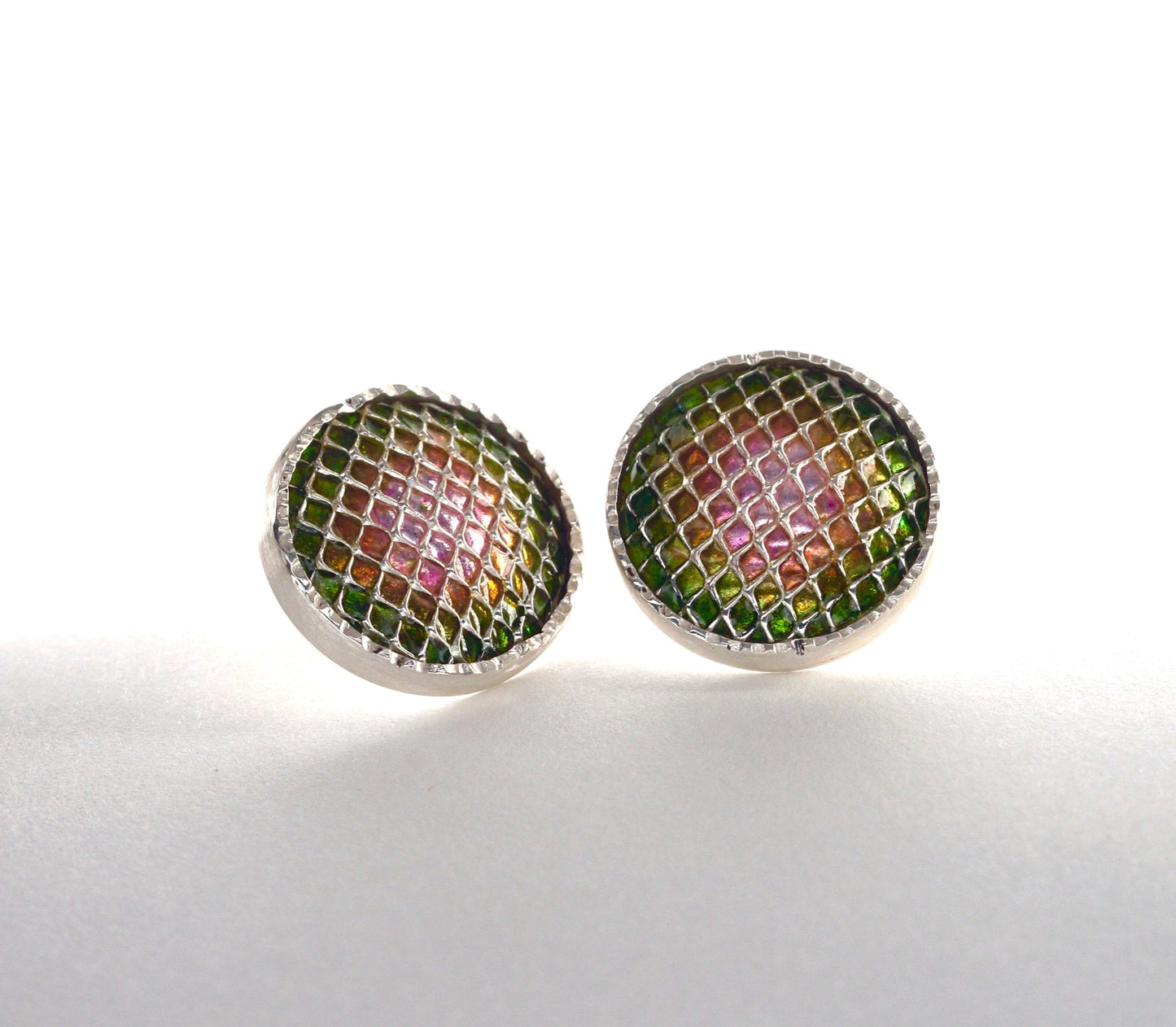 kiln fired enamel earrings in pink to green watermelon colors and silver gridwork in sterling silver bezels  Edit alt text