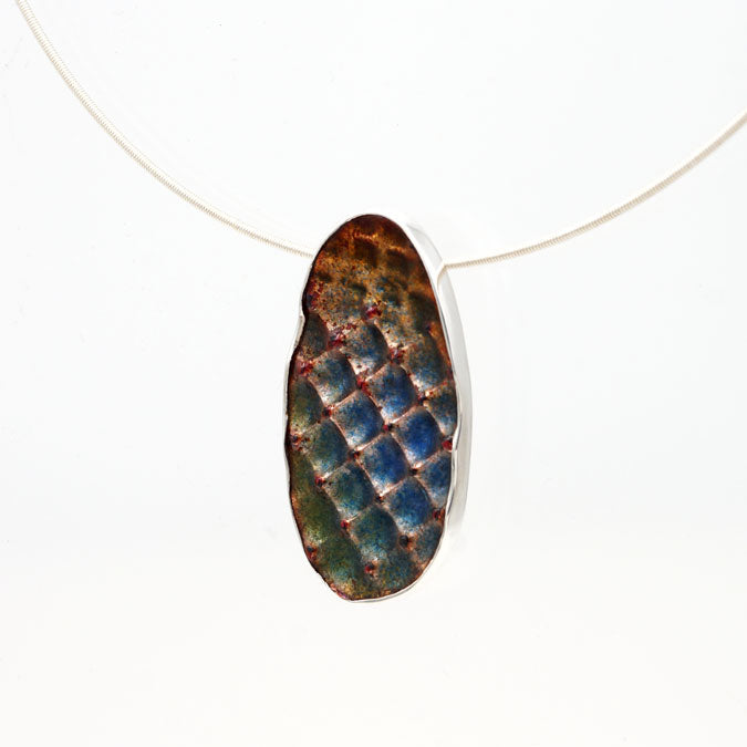 textured kiln fired enamel pendant in sterling silver mount