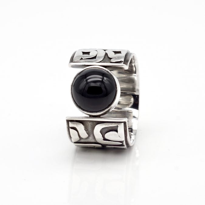 textured patterned sterling silver ring with onyx gemstone