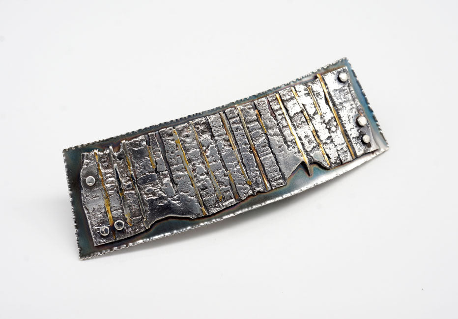 textural sterling silver and 24k gold brooch