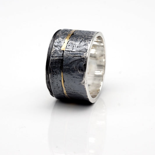 wide sterling silver and 24k gold band ring with dark patina and texture