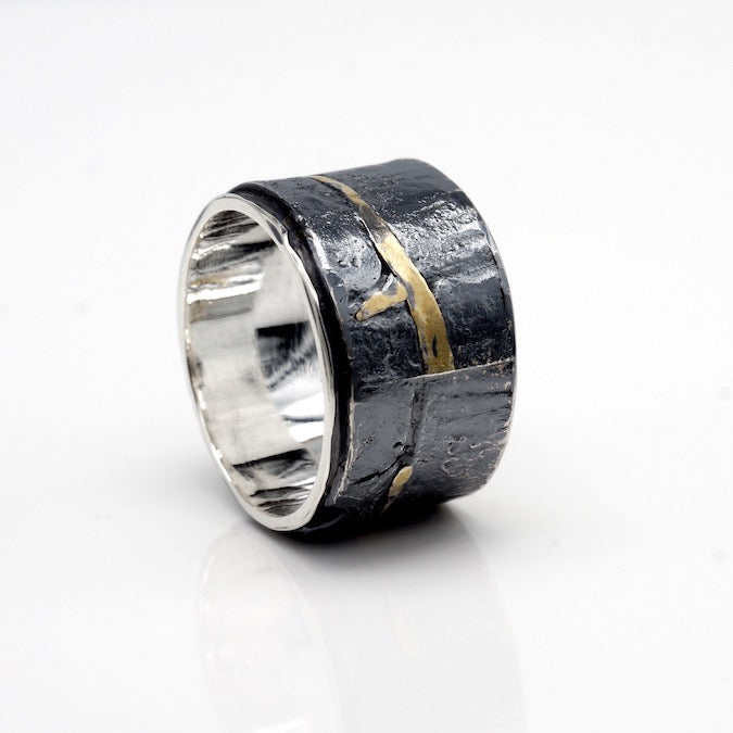 wide double band ring of oxidized sterling silver and 24k gold