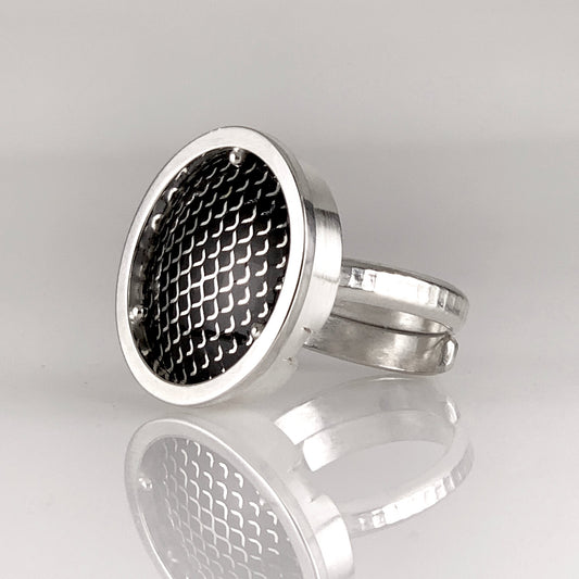 black fired enamel and sterling silver ring of modern design