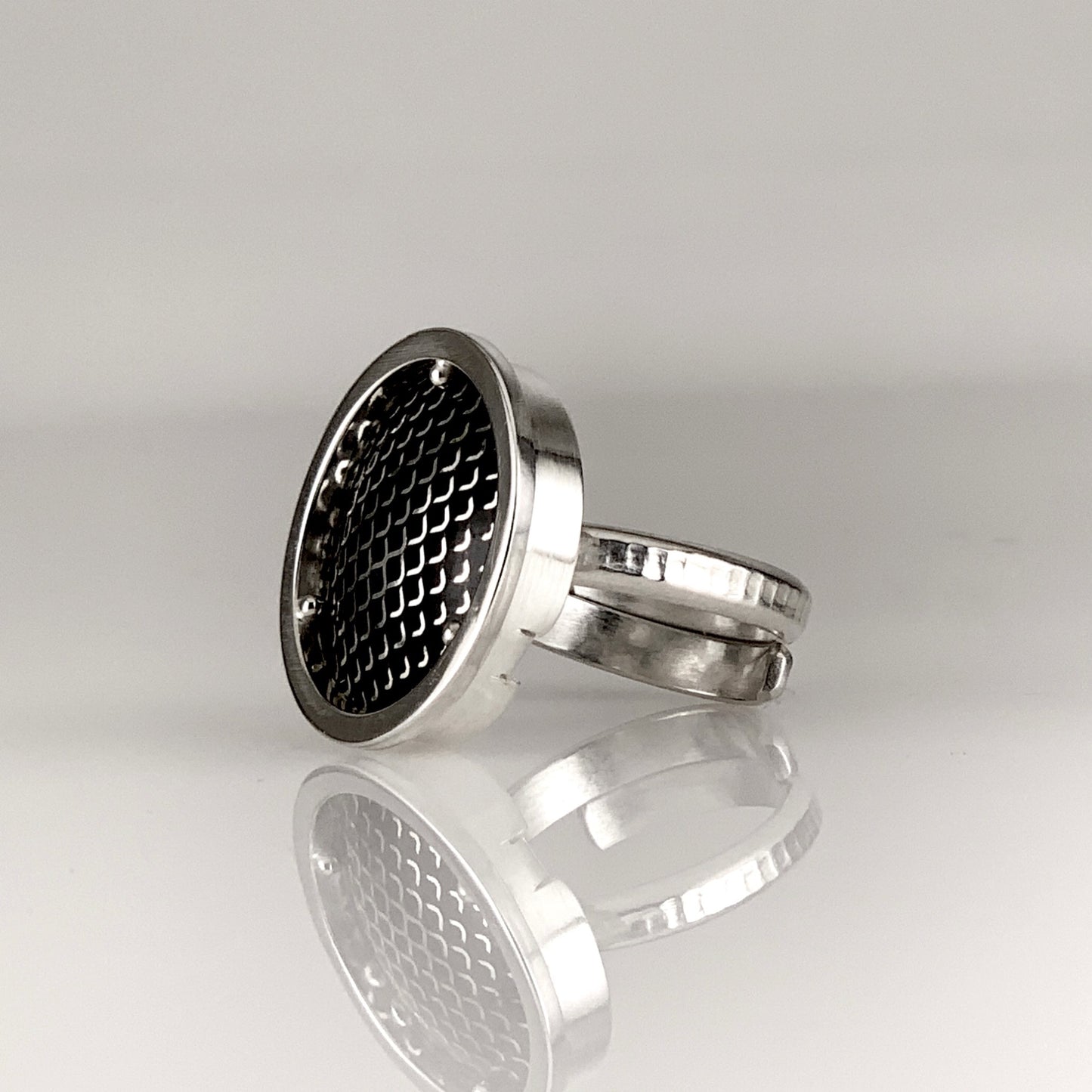 modern ring of black enamel with fine silver pattern set in sterling silver