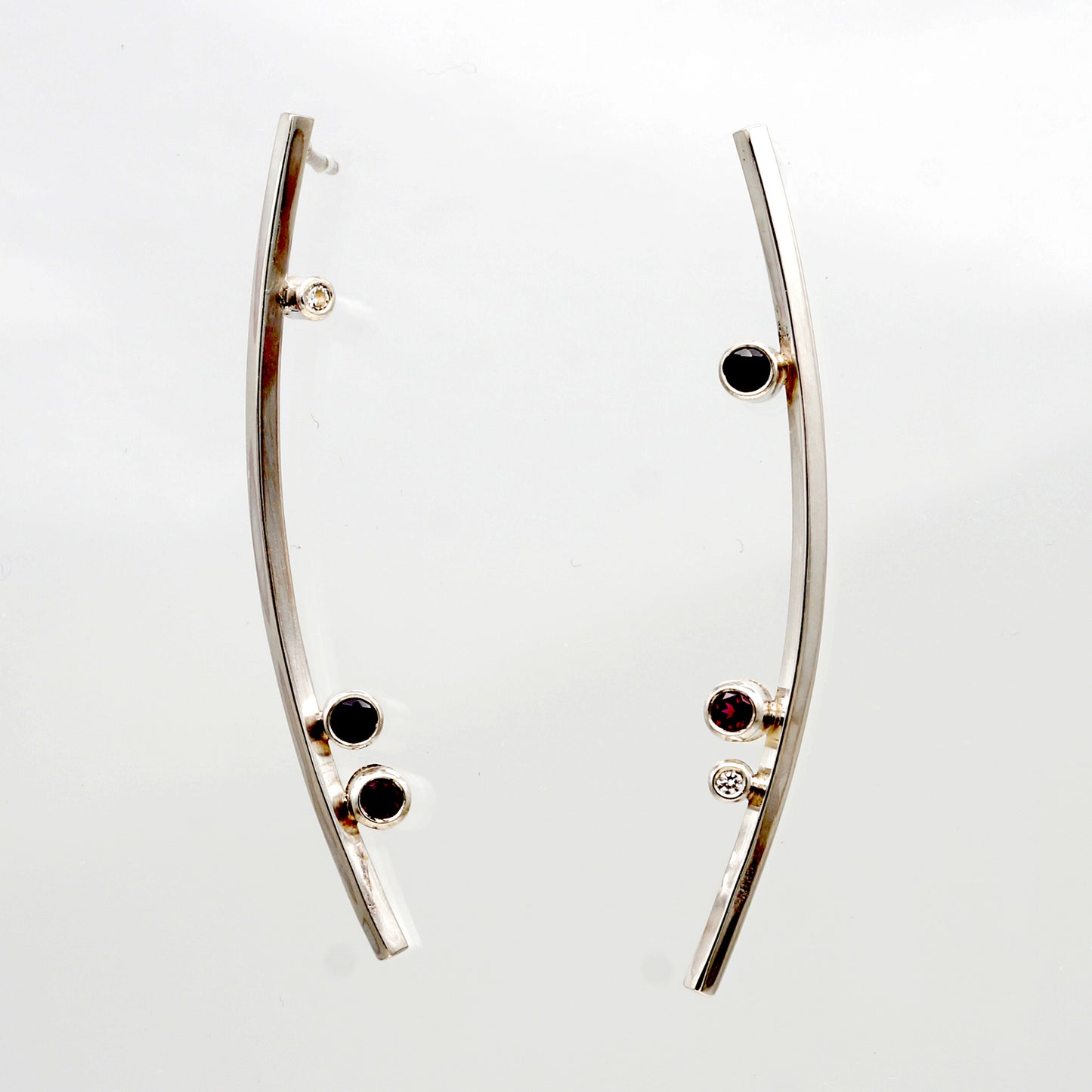 modern sleek sterling silver long earrings with gemstones