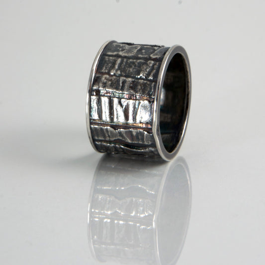 textured and oxidized sterling silver band ring