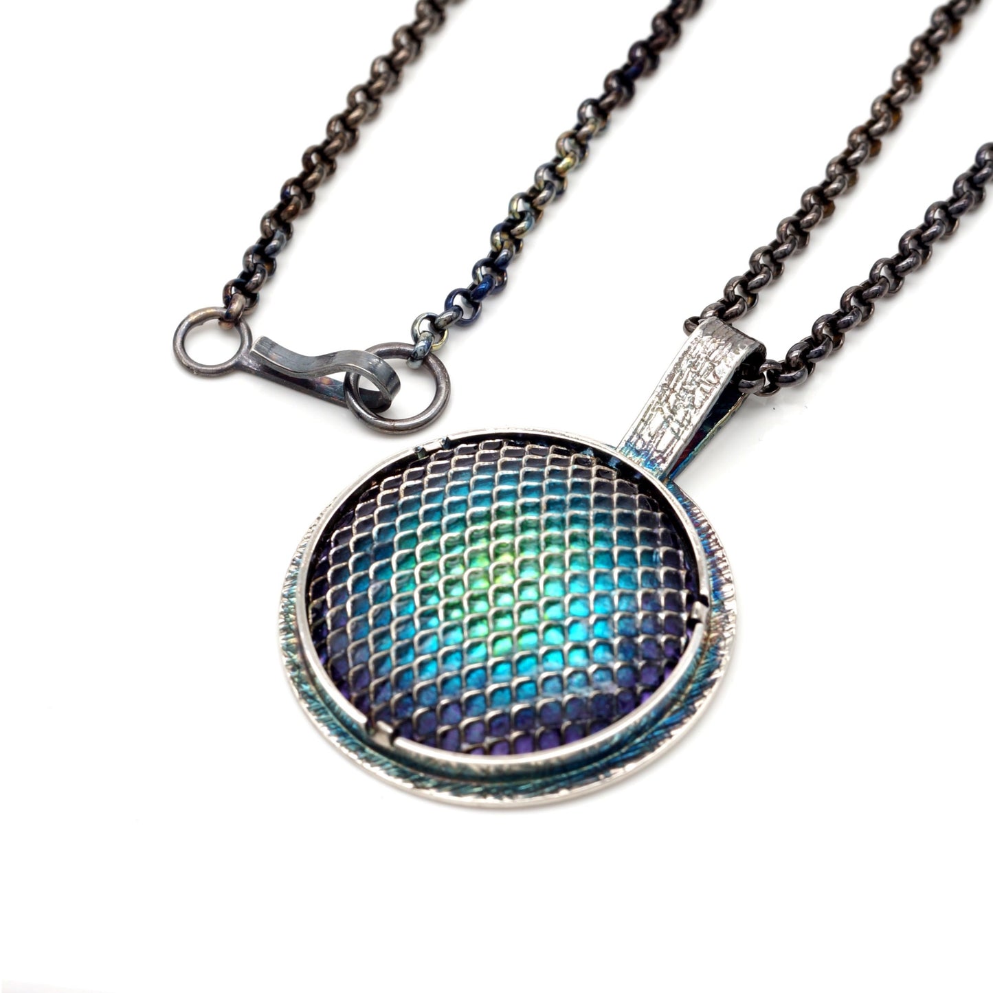 blue, peacock green and lime green shaded vitreous enamel with silver grid and setting