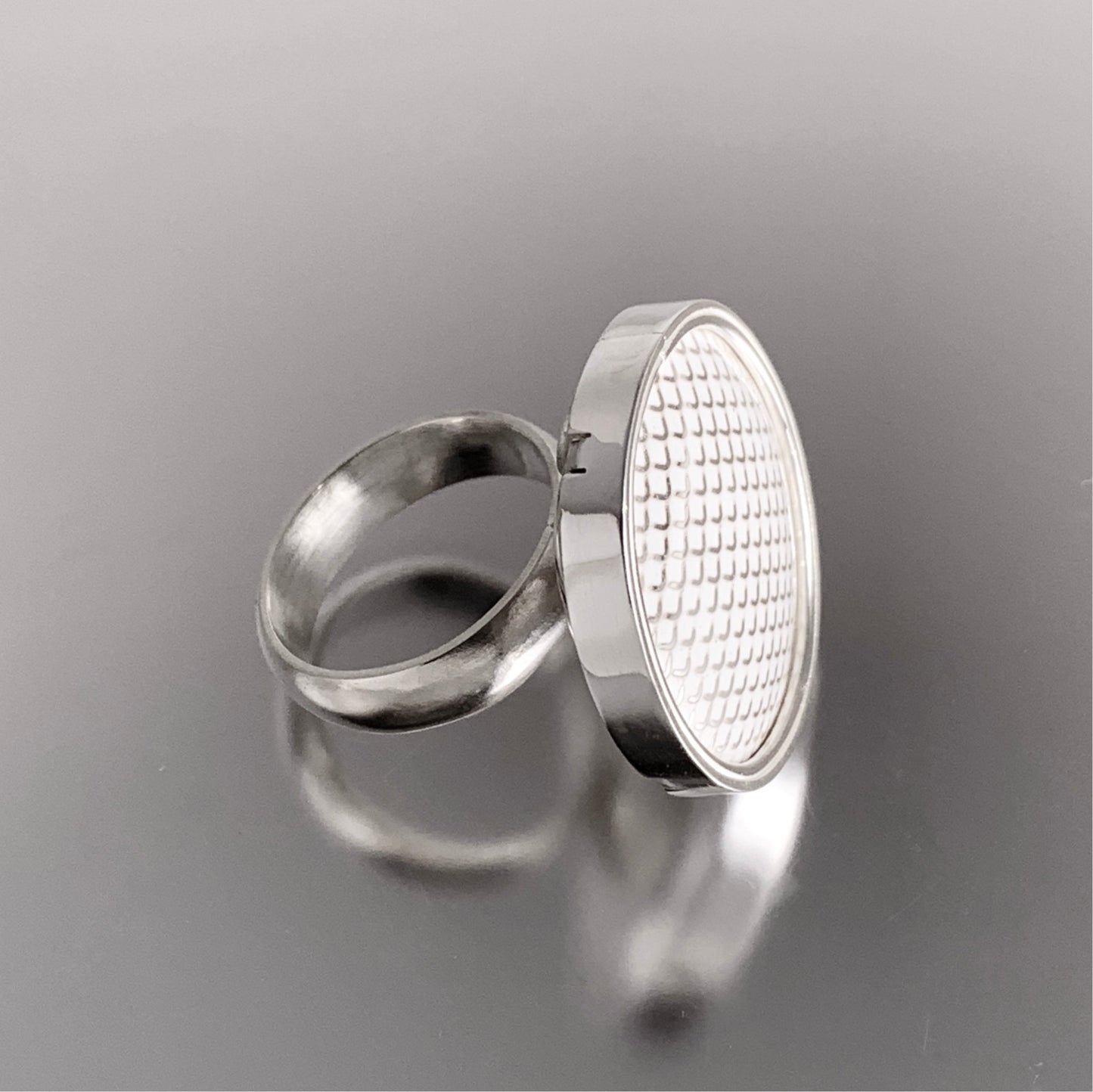 modern white and silver vitreous enamel statement ring